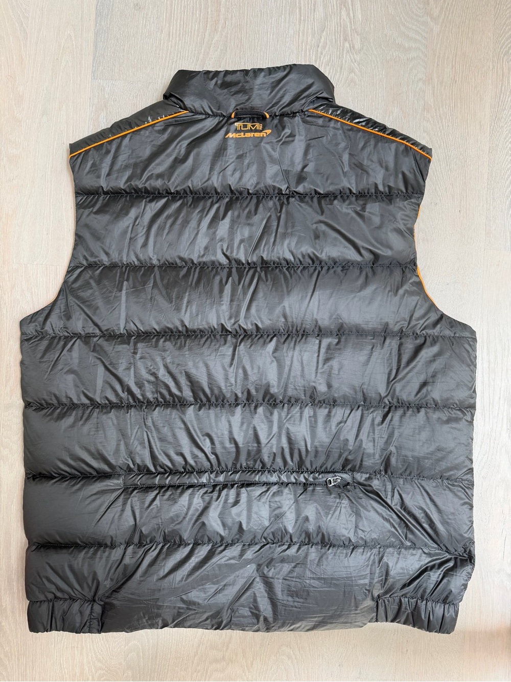 TumiPAX McLaren Packable Black Puffer Vest/Pillow with Orange Trim - Picture 6 of 12